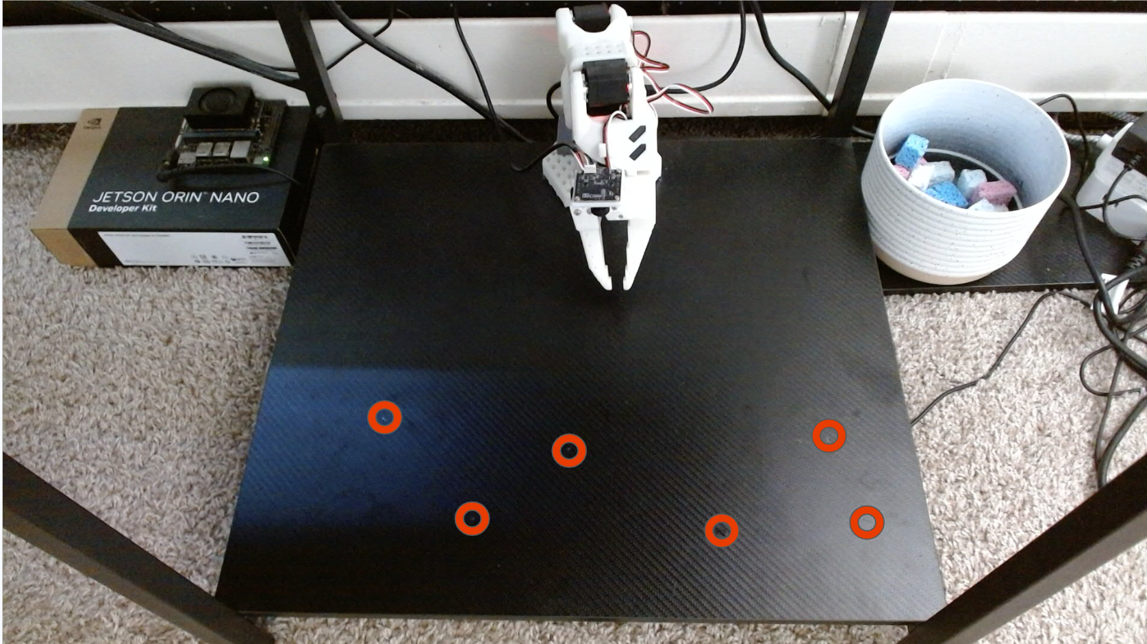 Marked known positions in the robot workspace